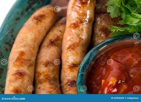 Closeup Of Delicious Grilled Sausages With Sauce Stock Image Image