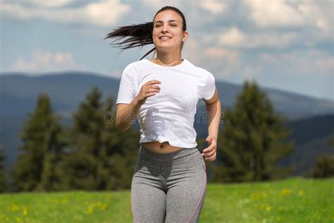 Young Woman Jogging In Nature Stock Photo Image Of Happy Adult 72412548