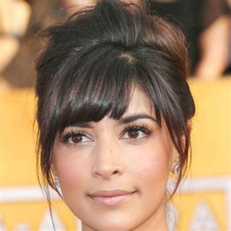 A medium length hairstyle with loose waves down, a braid on top and bangs plus a long veil. 50 Superb Wedding Looks to Try if You Have Short Hair Hair ...