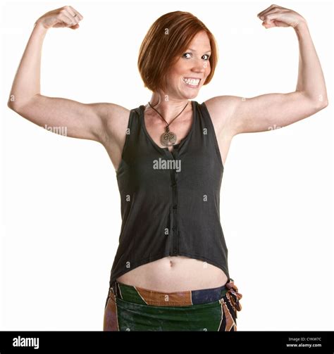 Happy Woman With Smile And Flexing Bicep Muscles Stock Photo Alamy