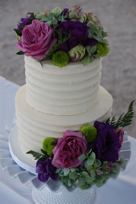 They're not too big, not too small, but just right. 2 tier wedding cake with florals # ...