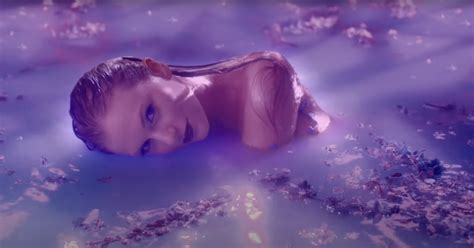 Taylor Swift Lays In Milky Purple Bath In Sultry Lavender Haze Video