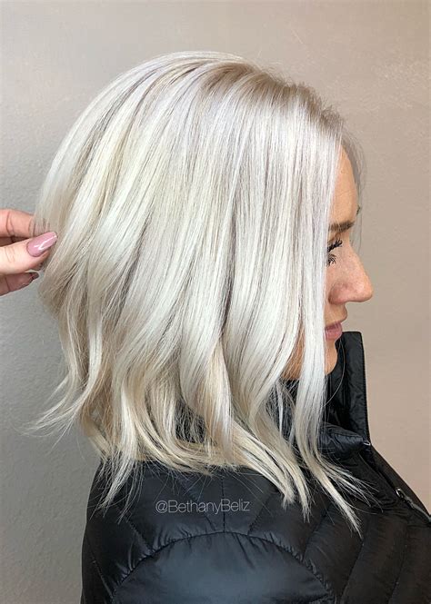 platinum blonde bleach and tone aline lob haircut platinum blonde hair icy blonde hair color
