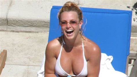 Britney Spears Poses Topless With Bikini Bottoms In Poolside Photos Hollywood Life
