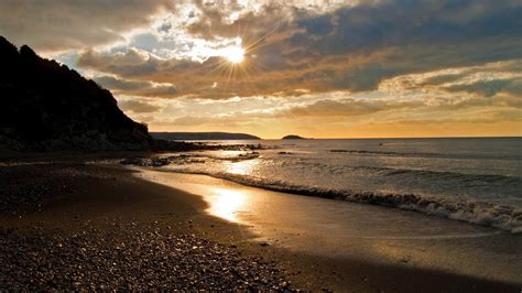 sunlight landscape sunset sea bay rock shore sand sky beach sunrise evening morning