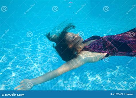 Beautiful Woman Girl Dress Underwater Diving Swim Blue Sunny Day Pool