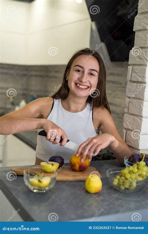 beautiful housewife during cooking process on breakfast in the kitchen stock image image of