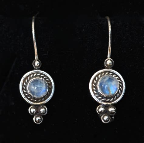 Sterling Silver Earrings Featuring Rounded Rainbow Moonstone Cabochons