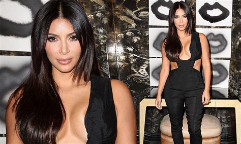 kim kardashian makes sure all eyes are on her in revealing black jumpsuit daily mail online