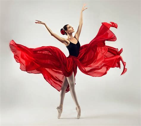 Download Ballet Dancer In Stunning Dress Wallpaper