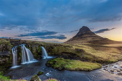 Kirkjufellsfoss Waterfall And Kirkjufell Mountain In The Morning Stock