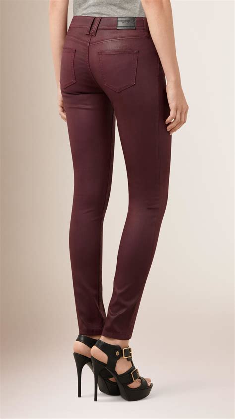 Lyst Burberry Skinny Fit Low Rise Wax Coated Jeans In Purple