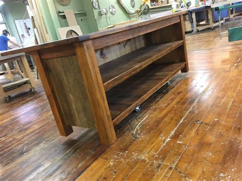 Hand Crafted Reclaimed Kitchen Island With Open Shelving And Wood Top