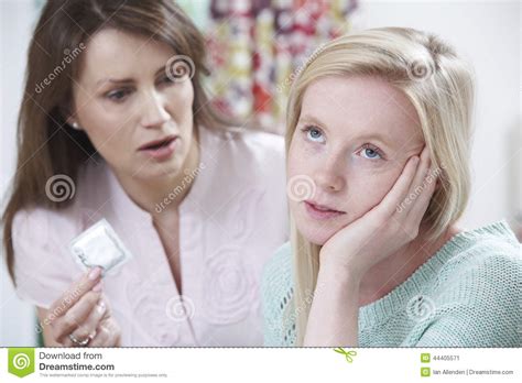 Mother Talking To Teenage Daughter About Contraception