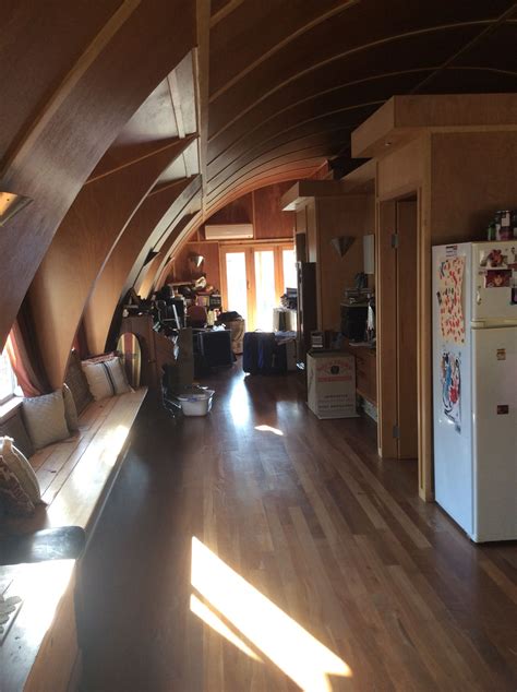Whereas others are square shaped and simply look like floating houses. Like the window seats | Quonset hut homes, Arched cabin ...
