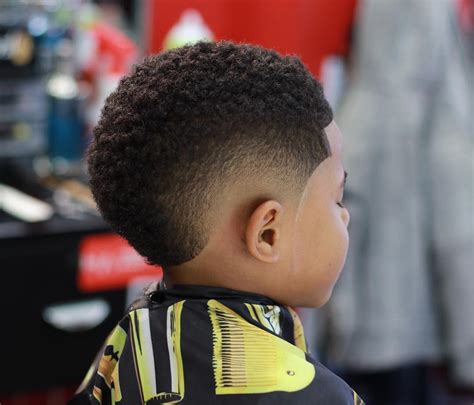 Tapering, when your hair subtly changes from one length to another, combined with fading is a flattering combination on all men and super attractive. 35 Popular Haircuts For Black Boys: 2021 Trends