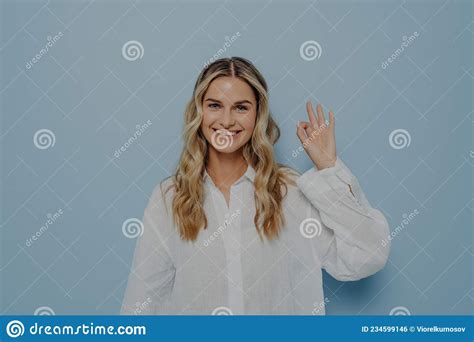 Joyful Blonde Woman Making Ok Gesture With Hand Stock Photo Image Of
