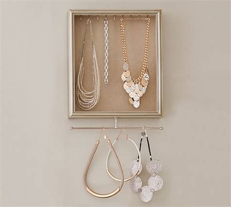 Having tangled necklaces is not only a hassle but can damage your most valued pieces of jewelry. Blake Wall Mount Jewelry Shadow Box | Pottery Barn