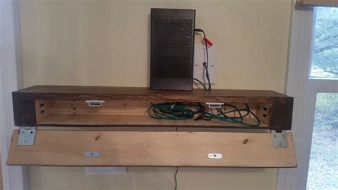 Custom Floating Shelf With Hinged Lid To Hide The Wire Mess Once Part