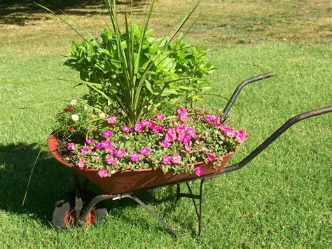 Way To Use That Old Wheelbarrow As A Planter Ideas And Pictures My