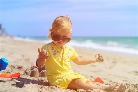 Cute Little Girl Play With Sand On Beach Stock Image Image Of Cute