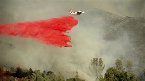 Thousands Flee As Flames Race Across California Bt