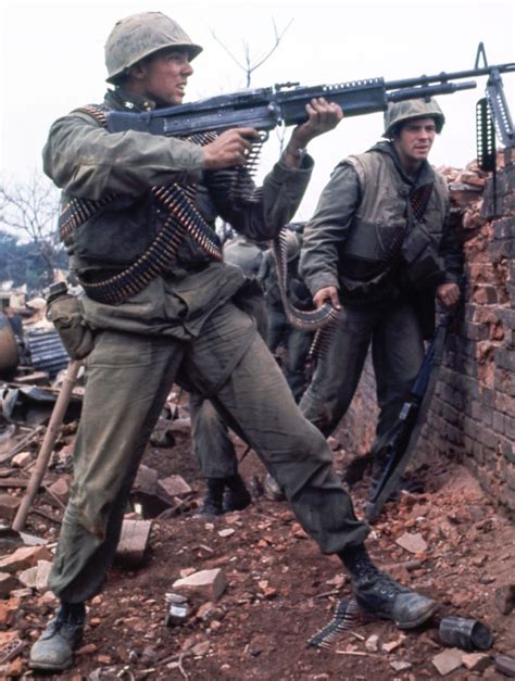 Hue South Vietnam February 1968 A Us Marine Fires At The Enemy Over One Of The Outer Walls
