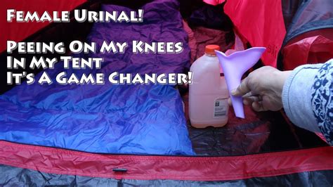 woman peeing on her knees in a tent using a female urinal demonstration youtube