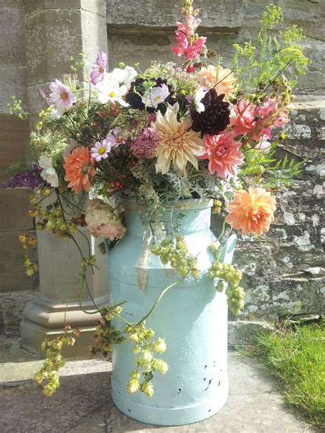 Embracing Summer Flower Churn At Church Entrance By