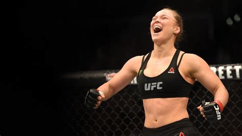 Ufc Ronda Rousey Stops Cat Zingano In Record Breaking 14 Seconds Mma