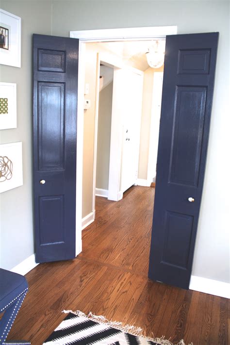 If you like to paint the door a deeper color, start with the trim, sit for at least 24 hours, tape it off, and paint the central part of the door. How To Paint Your Interior Doors...The Easy Way (Part 2) - Lorri Dyner Design