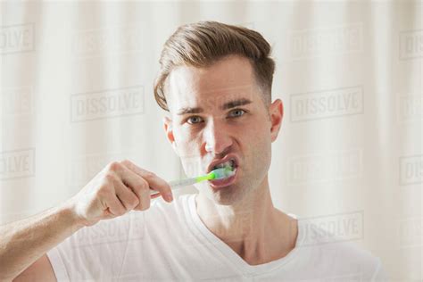 Man Brushing Teeth