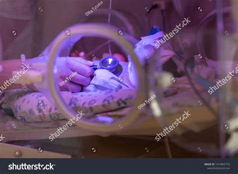 Female Doctor Examining Newborn Baby Incubator Stock Photo 1414002770