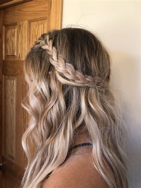 Do you know why half up half down hairstyles are among the most popular choices for prom? Braided half up half down hairstyle | Prom hair down ...