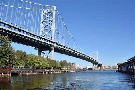 Ben Franklin Bridge Towers Above The Race Street Pier In Philly On The