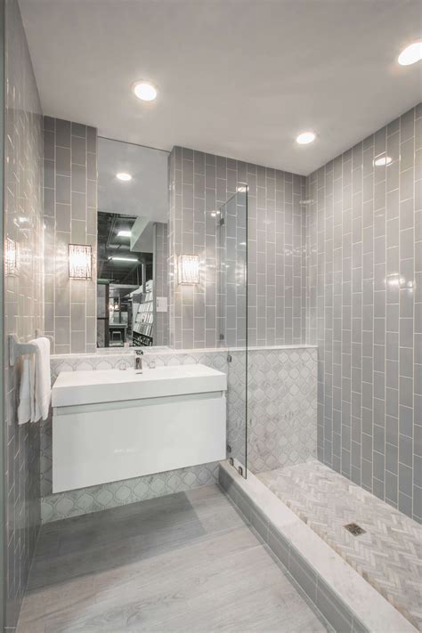 We love this bathroom from charlie interior design that features a tiled floor and wall with gray and white tiles that are just different enough to create delineation. 12 White Modern Bathroom Ideas, Most Fashionable and also ...