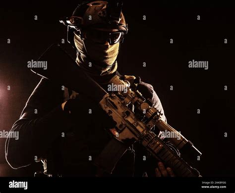 Army Marksman With Sniper Rifle In Darkness Stock Photo Alamy