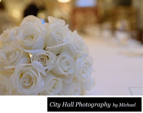 In the photography world, there are a million ways to light one simple scene. White roses at Wedding Reception using close-up lens - Amy and Patrick City Hall Wedding Gallery ...