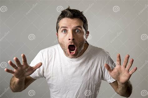 Young Attractive Man Astonished Amazed In Shock Surprise Face Expression And Shock Emotion Stock
