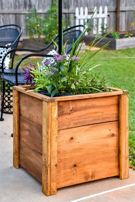 You can add a whim there by doing something unique, by following one of these ideas. DIY Wood Planter Box