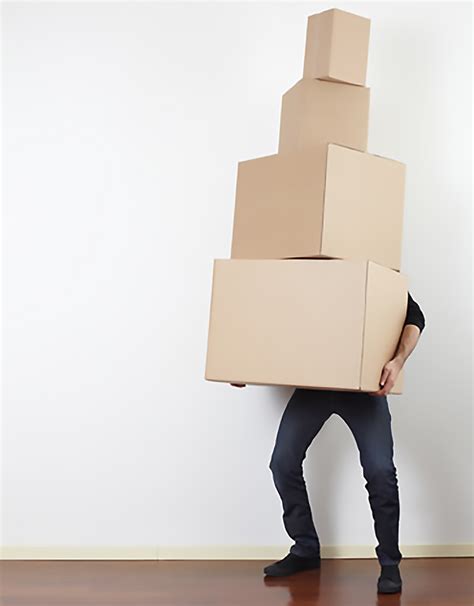 Man Lifting Cardboard Boxes In Apartment Moving Day 800 Atlas