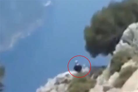 Chilling Moment Killer Husband Lures Pregnant Wife To Rocky Cliff Edge For Selfie Before Pushing