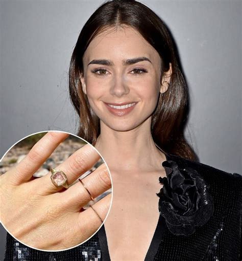 A Womans Engagement Ring With A Rose On It