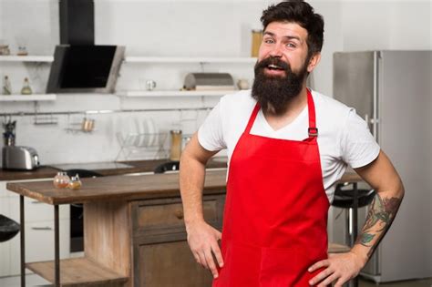 Premium Photo Confident And Experienced Chef Hipster In Kitchen Mature Male Bearded Man Cook