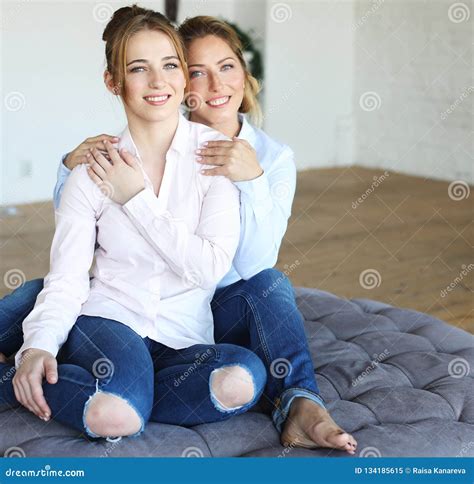 Happy Senior Mother Embracing Adult Daughter Laughing Together Stock Image Image Of Background