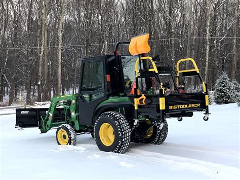 The New John Deere 2038r With Bigtoolrack Curtis Cab And Wr Long Plow