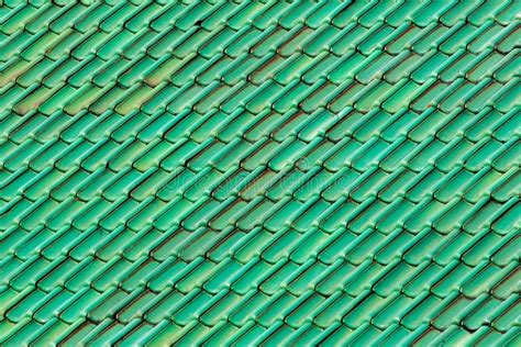 Vibrant Green Roof Tiles Patterned And Textured Background Image Of