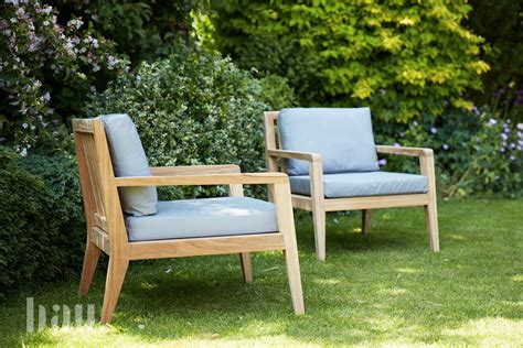Pair of mid century ercol wooden arm chairs with cushions. Menton Garden Armchair - Bau Outdoors