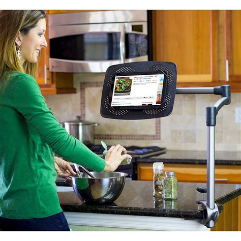 The Table Clamp Articulating Ipad Stand Hammacher Schlemmer