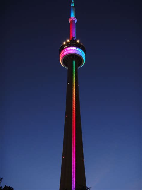 The Cn Tower Lit Up In A Rainbow To Celebrate The Pride Parade In